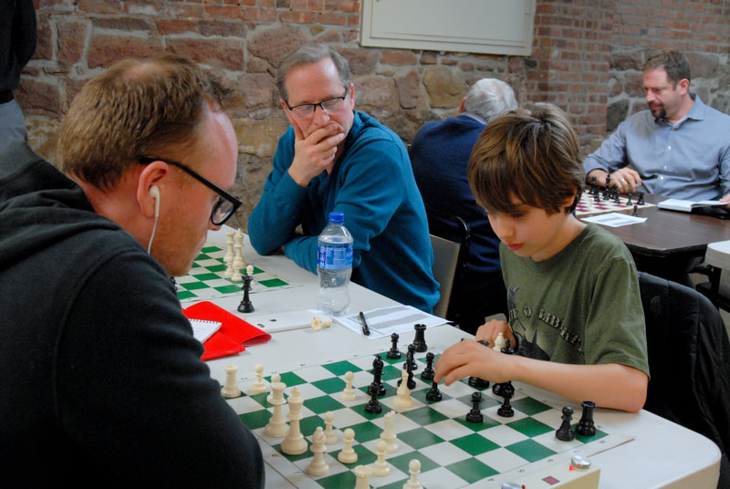Young spectator watching a game