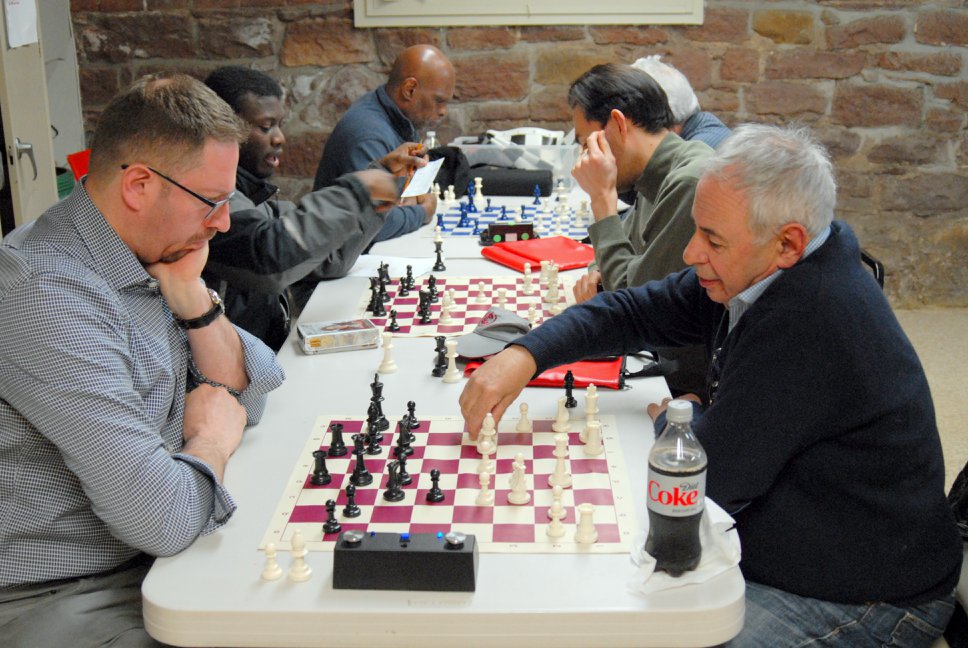 Players engaged in chess match