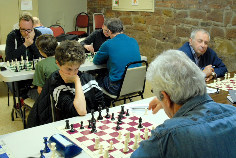 Young player contemplating next move